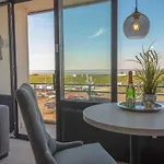 Fewo 304 mit Meerblick und Strandkorb im Haus Jan am Strand in Döse
